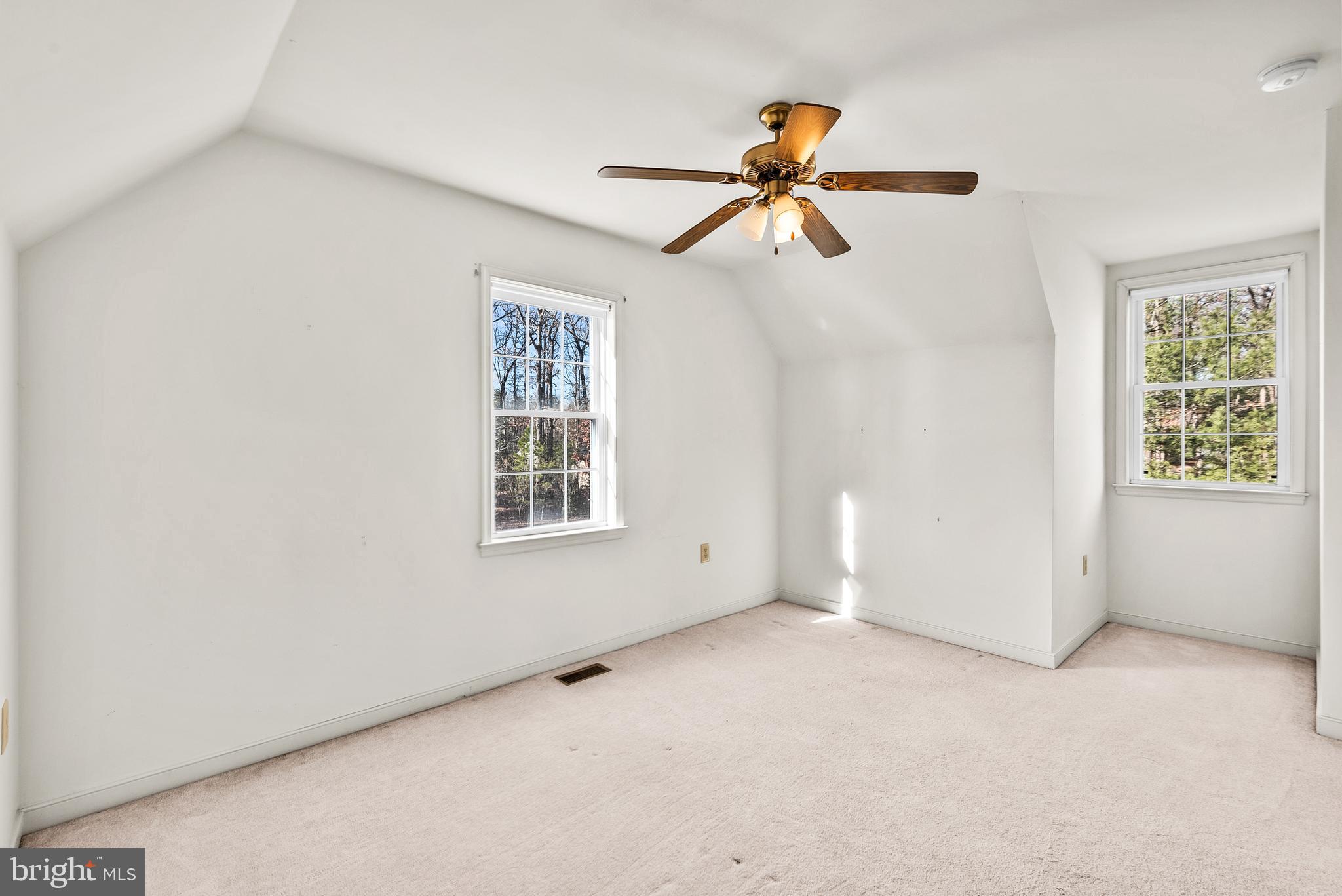18159 Miss Clara Lane Ruther Glen, VA 22546 - Photo 20 of 31 an empty room with windows and fan