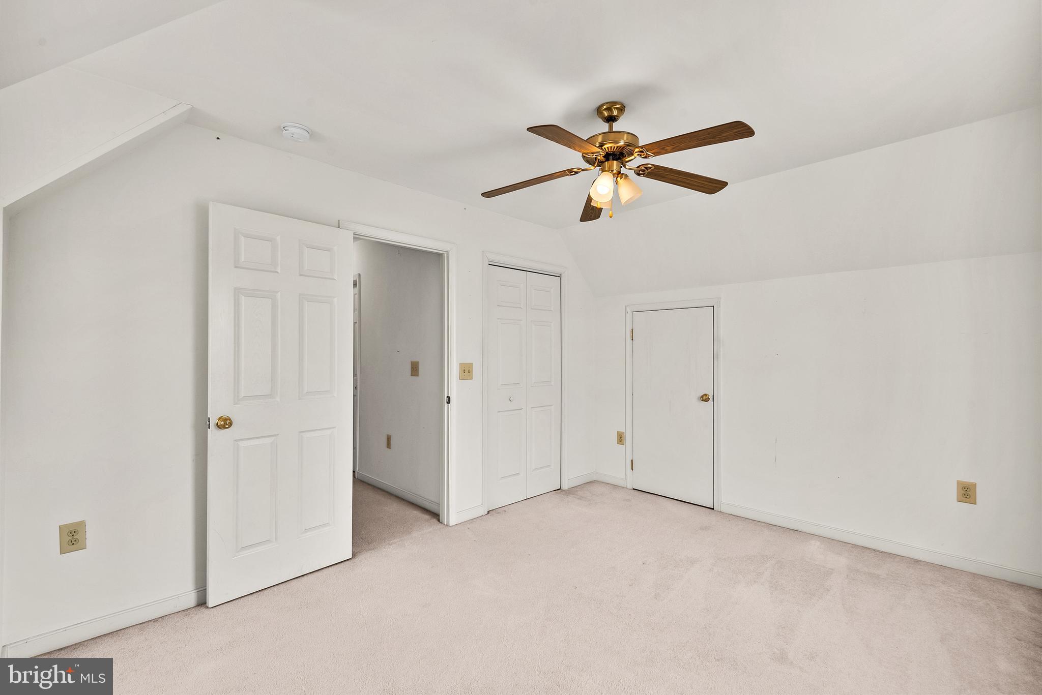 18159 Miss Clara Lane Ruther Glen, VA 22546 - Photo 21 of 31 an empty room with closet and a ceiling fan