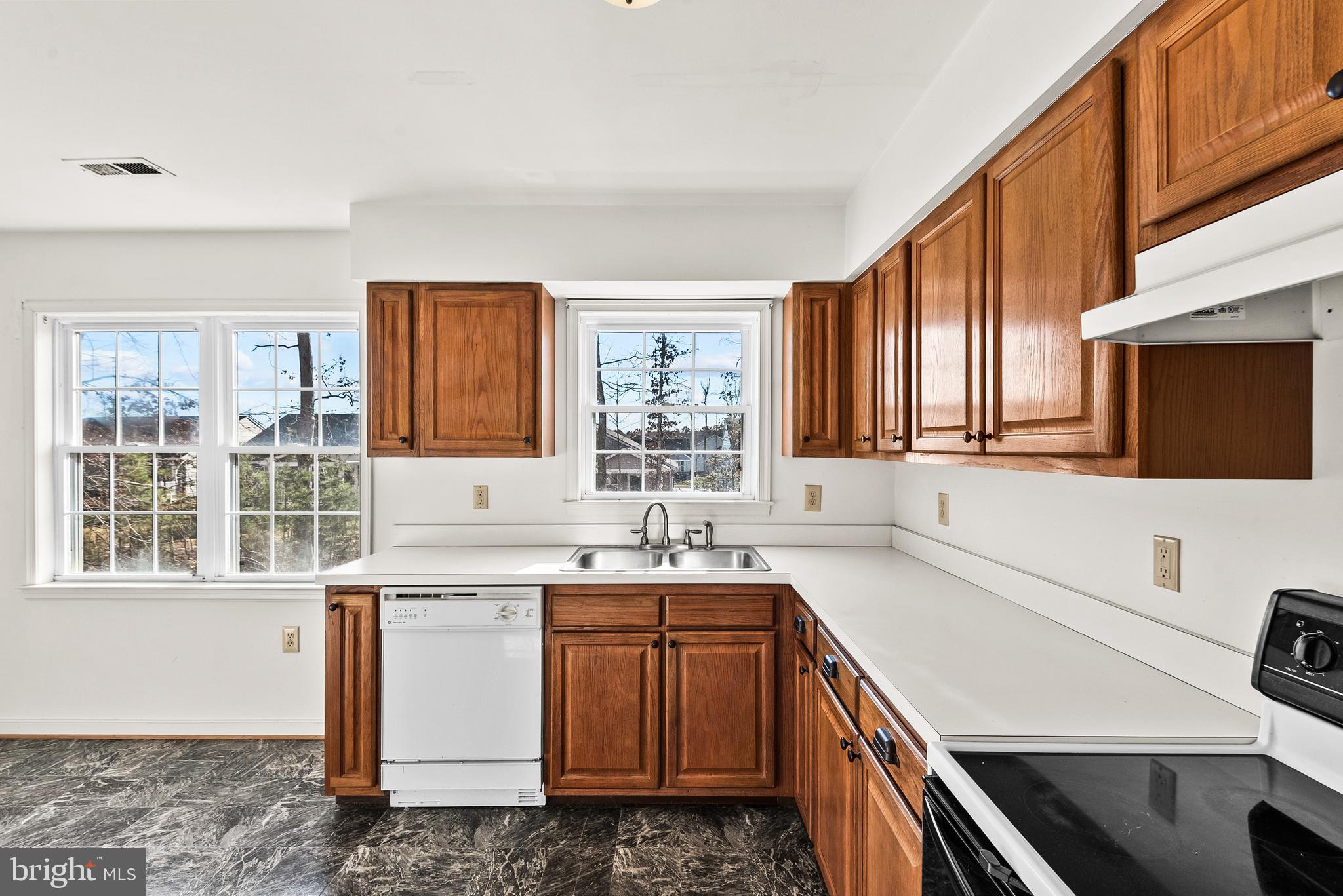 18159 Miss Clara Lane Ruther Glen, VA 22546 - Photo 10 of 31 a kitchen with a sink stove and cabinets