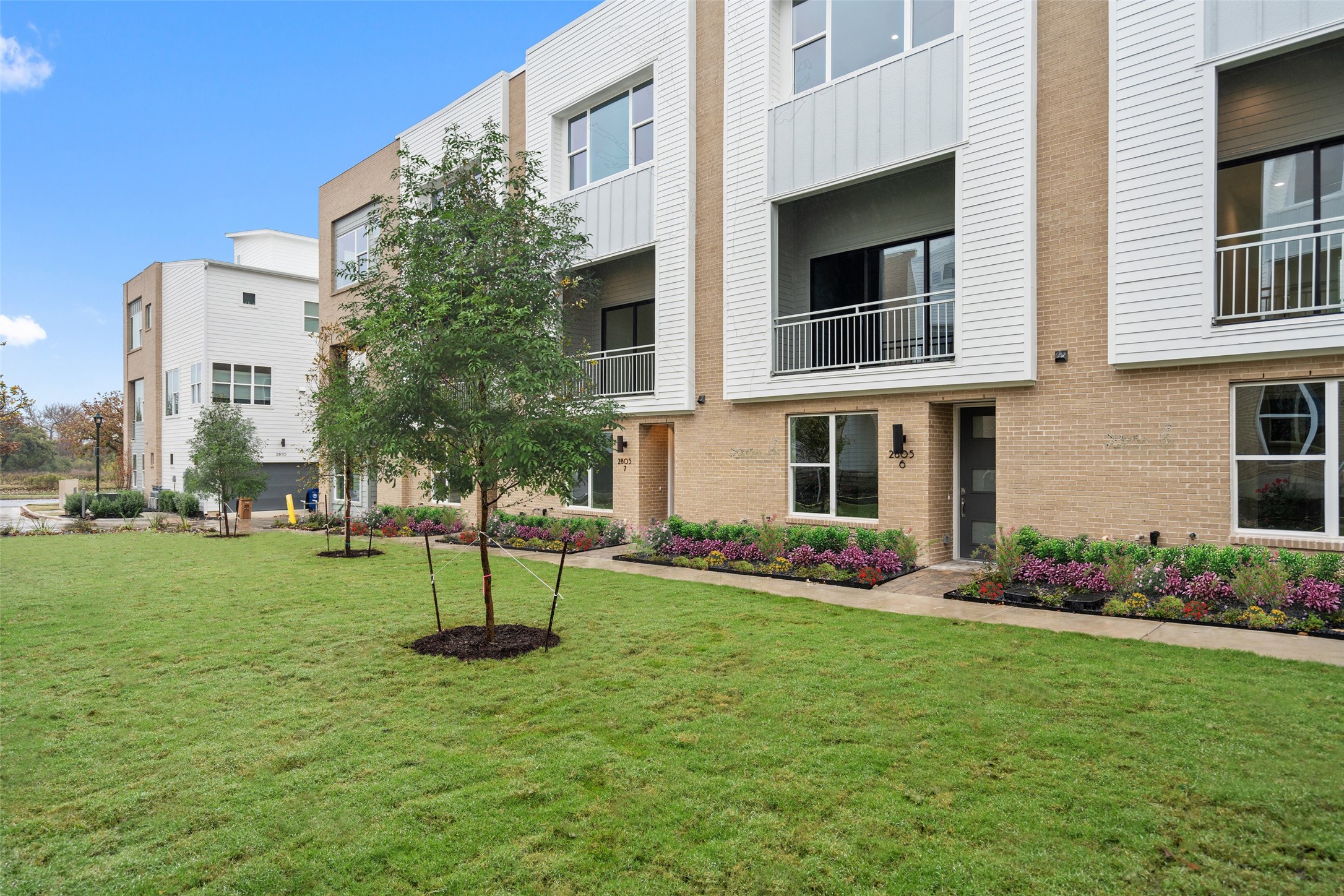 2805 McCurdy Street, Unit 6 Austin, TX 78723 - Photo 16 of 38 a front view of a house with a yard