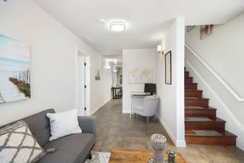 a view of work space with furniture and a window
