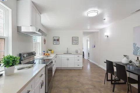 a bedroom with a bed and a lamp on table