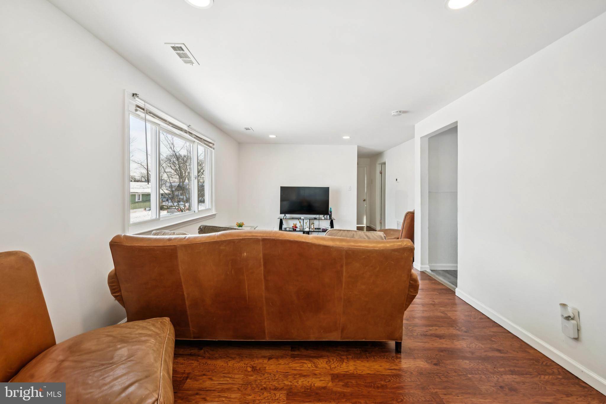 640 Bem Street Riverside, NJ 08075 - Photo 15 of 26 a living room with furniture and a window