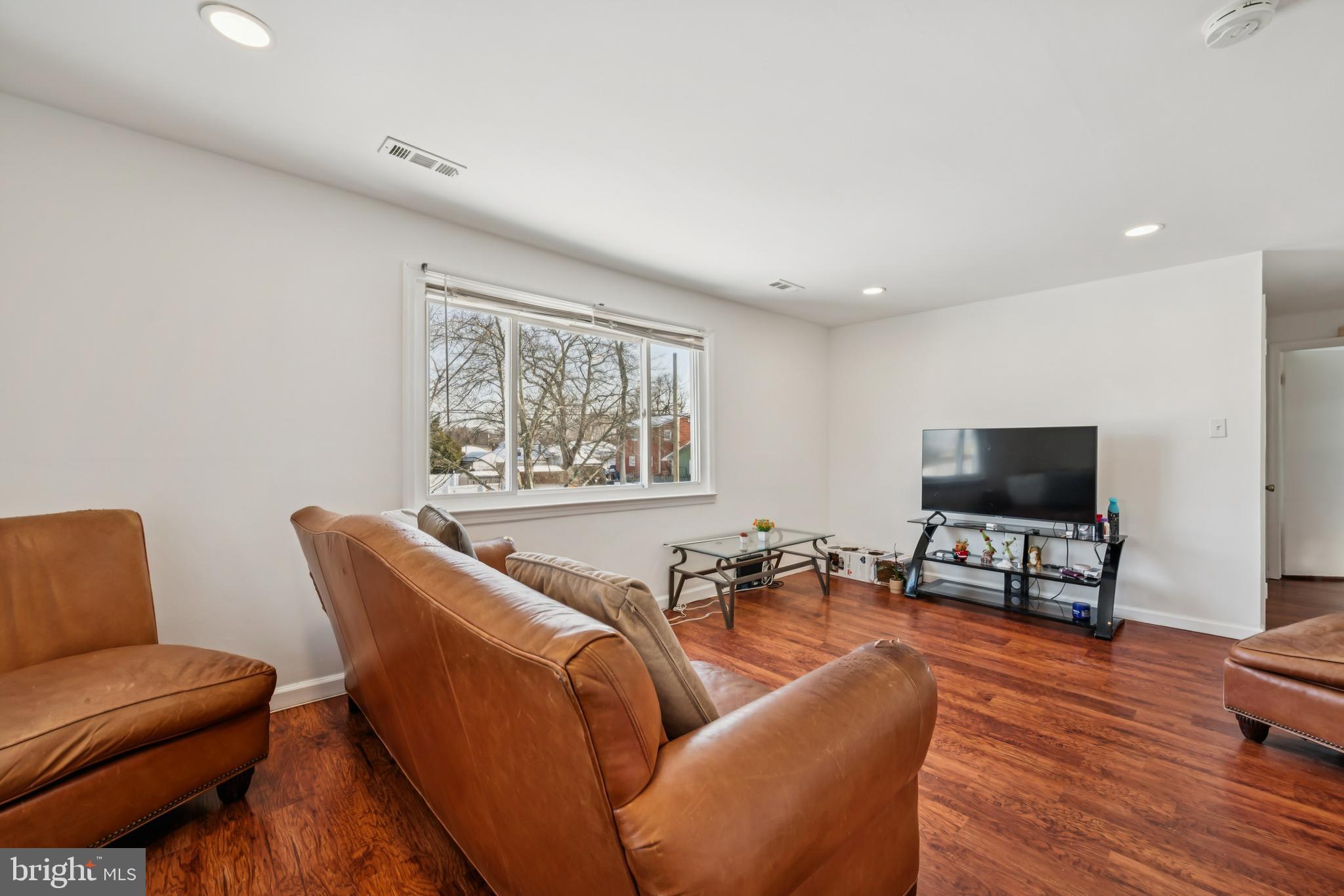 640 Bem Street Riverside, NJ 08075 - Photo 17 of 26 a living room with furniture and a flat screen tv