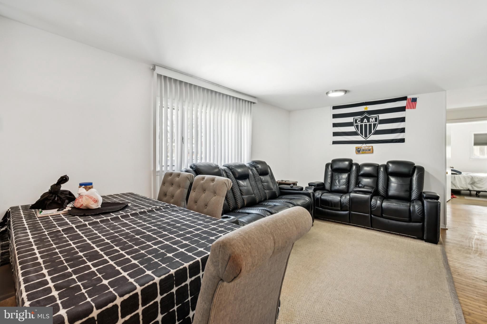 640 Bem Street Riverside, NJ 08075 - Photo 4 of 26 a bedroom with two beds and a couch