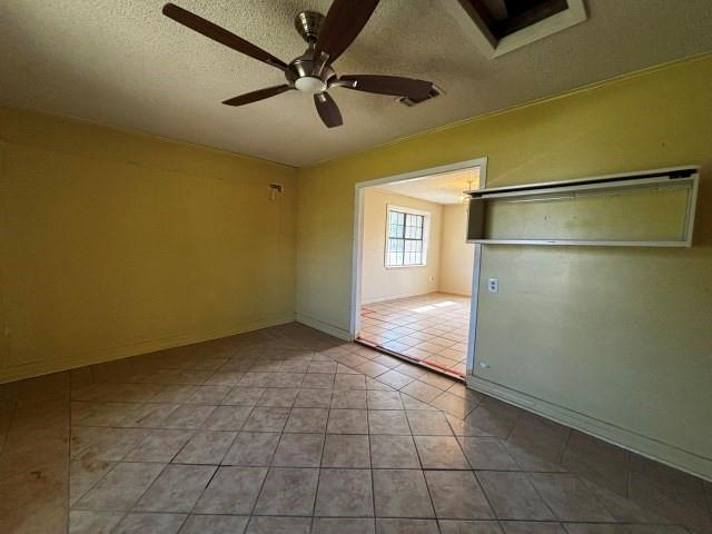 122 Rosa Street Edna, TX 77957 - Photo 10 of 17 a view of an empty room with a window