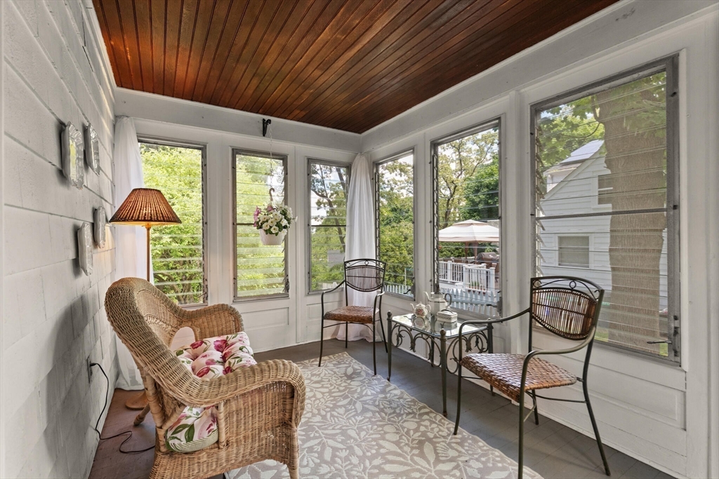 19 Pine Hill Circle Wakefield, MA 01880 - Photo 27 of 31 a living room with furniture and a large window