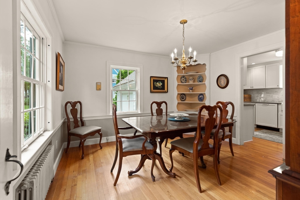 19 Pine Hill Circle Wakefield, MA 01880 - Photo 9 of 31 a view of a dining room with furniture window and wooden floor