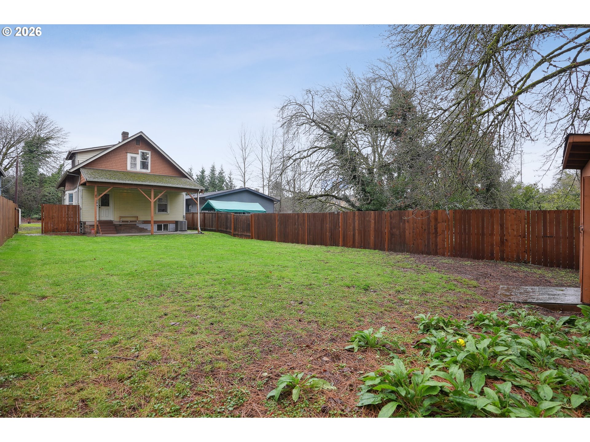 9306 Southwest 30th Avenue Portland, OR 97219 - Photo 28 of 30 a view of a house with a yard