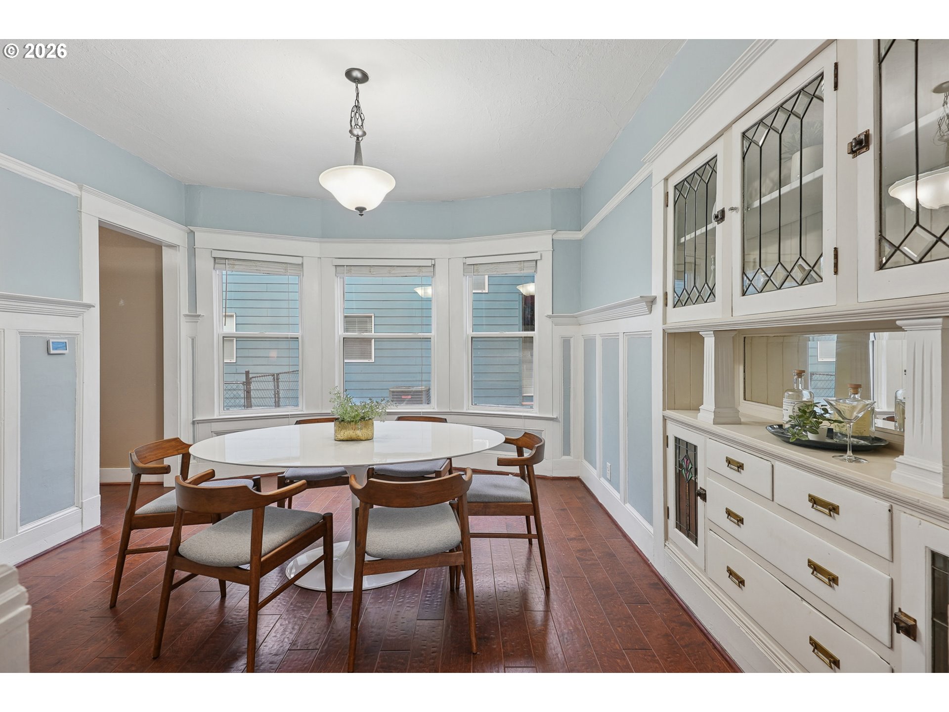 9306 Southwest 30th Avenue Portland, OR 97219 - Photo 7 of 30 a view of a dining room with furniture and windows