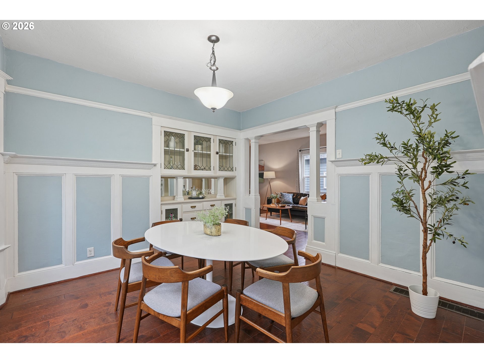 9306 Southwest 30th Avenue Portland, OR 97219 - Photo 9 of 30 a view of a dining room with furniture and wooden floor