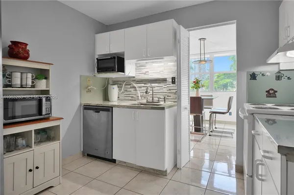 a view of balcony with outdoor seating and city view