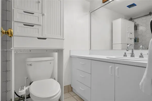 a room with gym equipment and a mirror