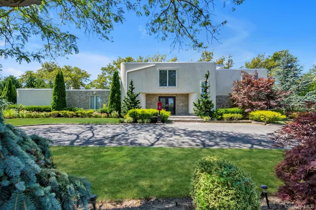 a view of a house with a garden