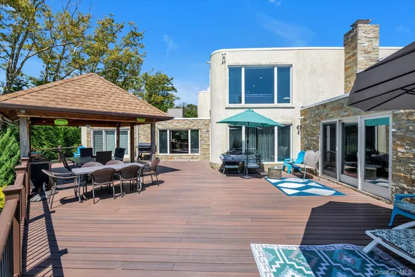 a view of a house with sitting area and furniture