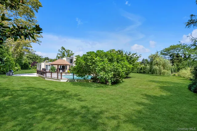 a view of a house with a big yard