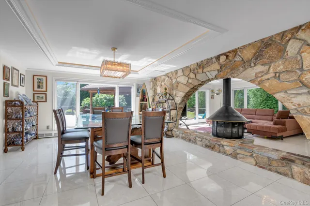 a view of a dining room with furniture window and outside view