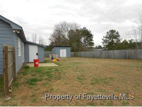 5212 Lacrosse Point Raleigh, NC 27615 - Photo 12 of 12 huge fenced in yard w/shed
