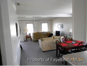5212 Lacrosse Point Raleigh, NC 27615 - Photo 4 of 12 Living room from kitchen
