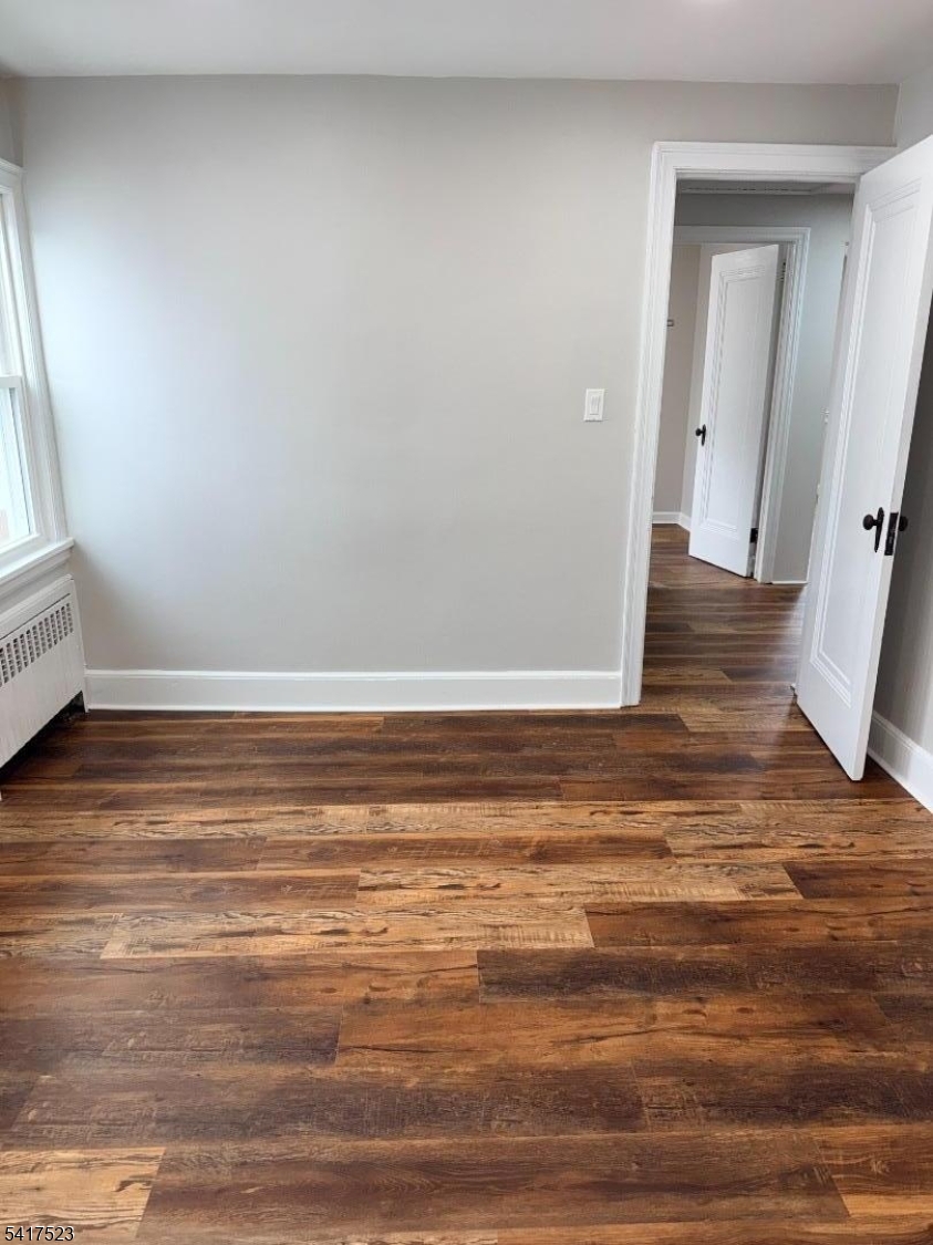 2021 Tyler Street Union, NJ 07083 - Photo 8 of 14 a view of room and wooden floor