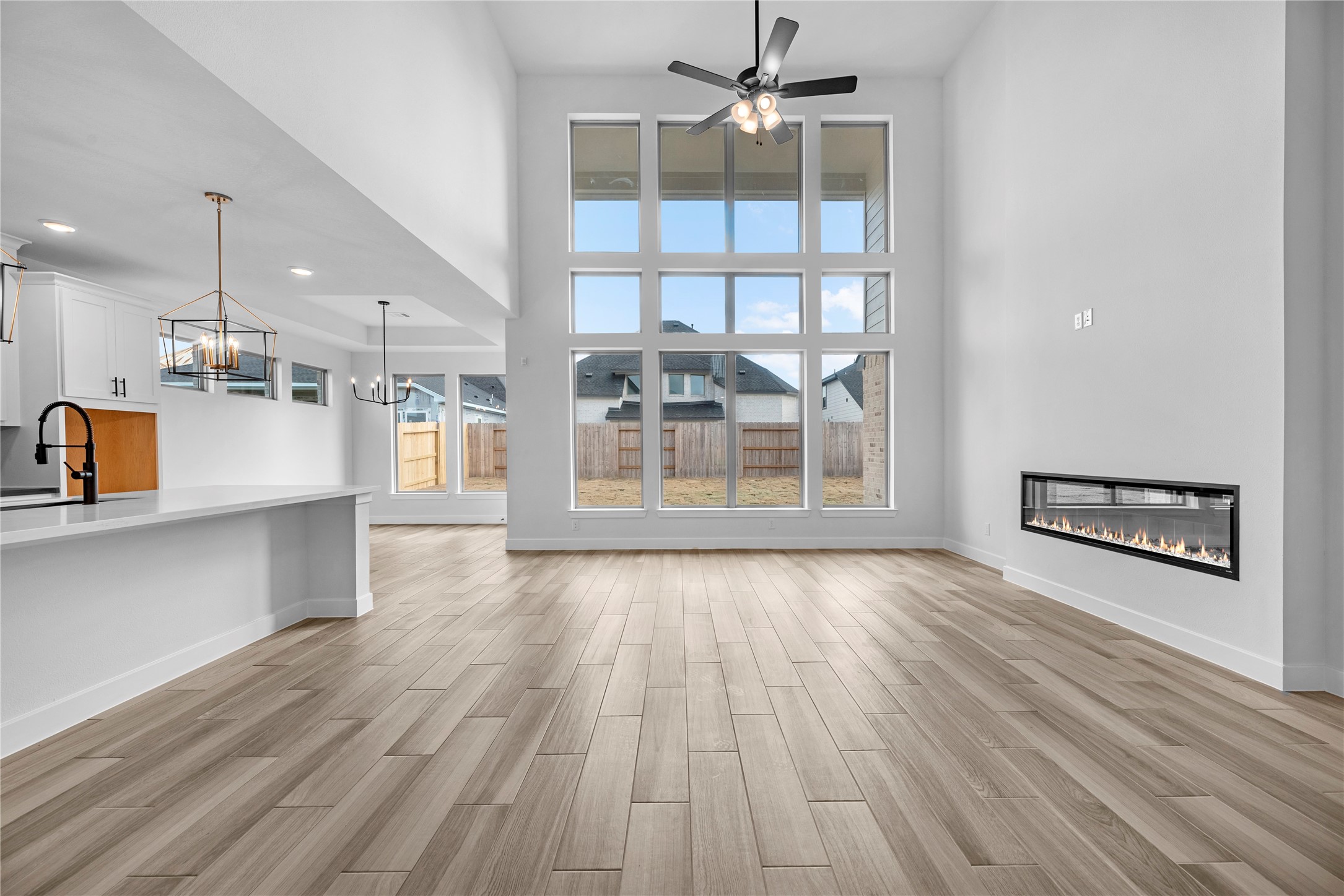 615 Roland Lane Rosenberg, TX 77471 - Photo 3 of 26 a view of a room with wooden floor and windows