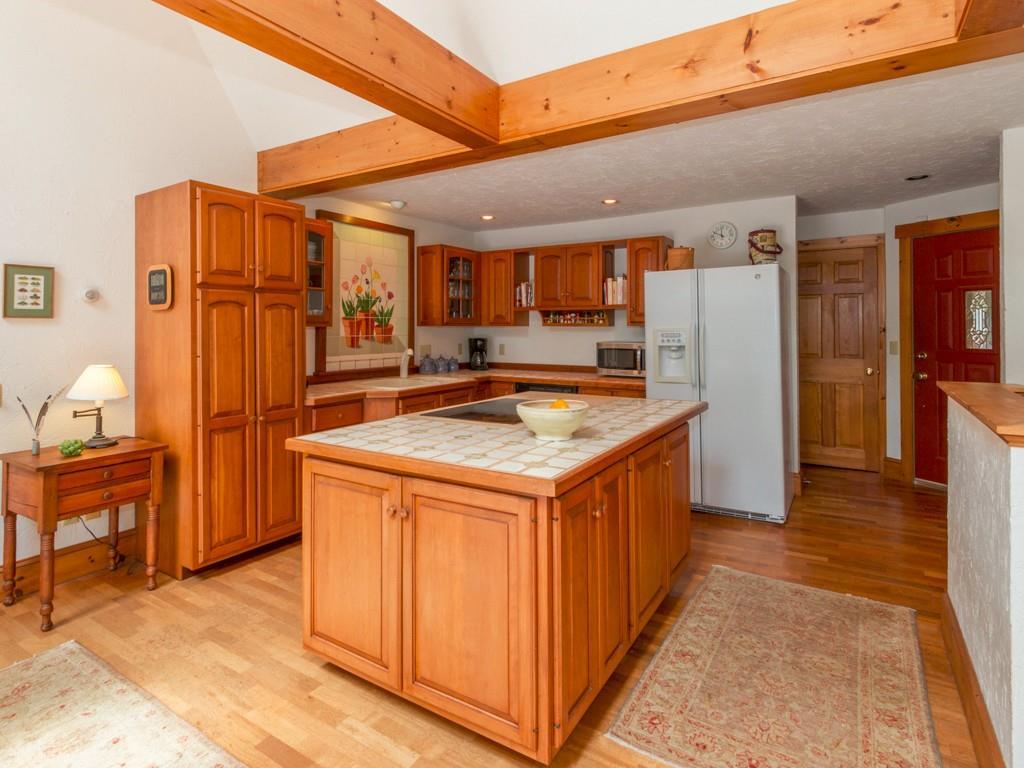 34 Eider Cove Road Castine, ME 04421 - Photo 9 of 35 A large eat-in kitchen off the...