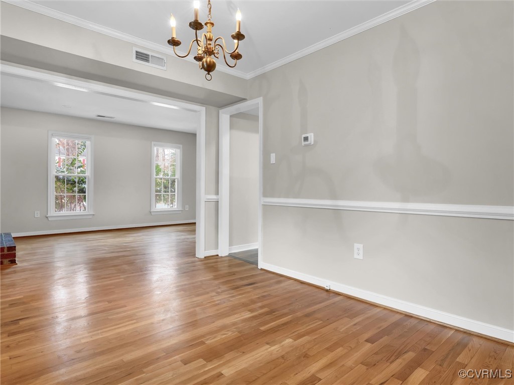 4716 Archduke Road Glen Allen, VA 23060 - Photo 16 of 33 Dining room featuring crown molding, light hardwoo