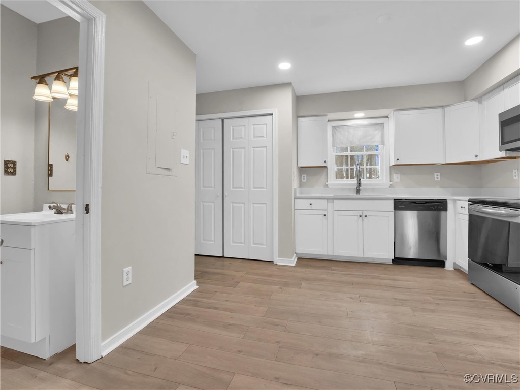 4716 Archduke Road Glen Allen, VA 23060 - Photo 9 of 33 Kitchen featuring white cabinets, stainless steel