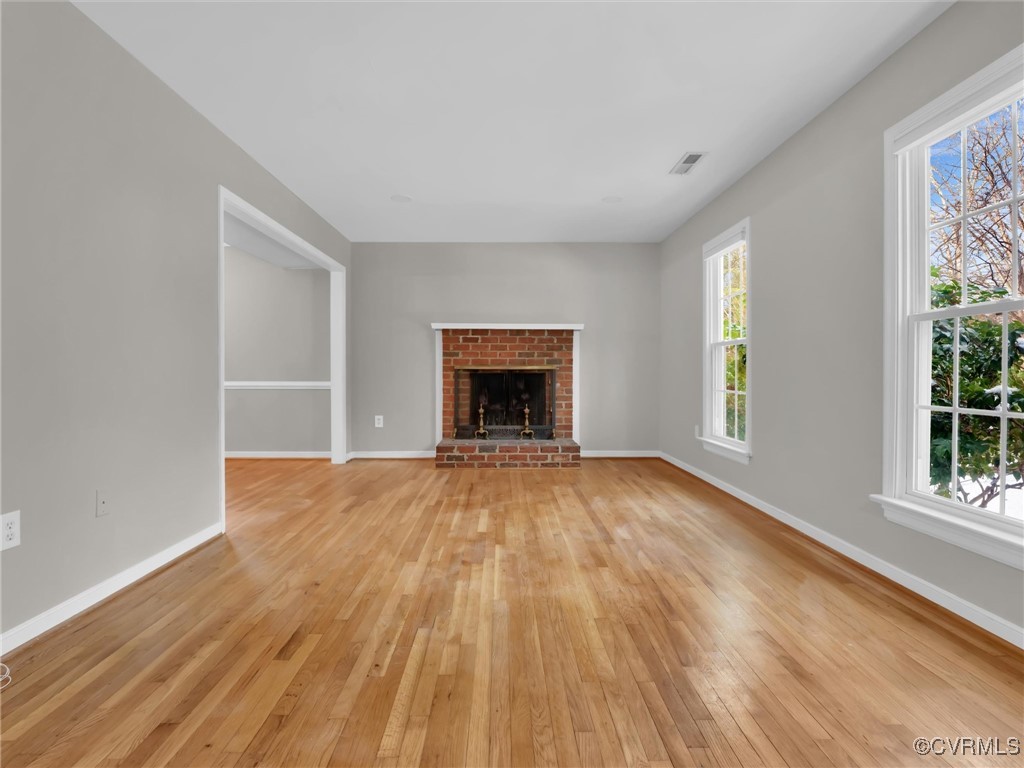 4716 Archduke Road Glen Allen, VA 23060 - Photo 10 of 33 living room with light hardwood flooring and a bri