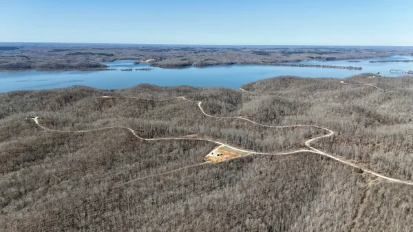 an aerial view of mountain with beach