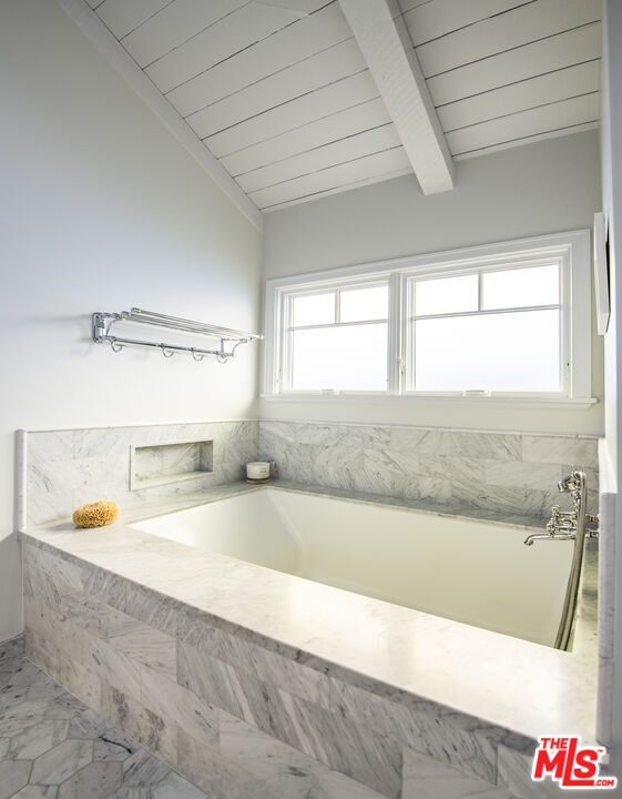 5549 Green Oak Drive Los Angeles, CA 90068 - Photo 14 of 26 a bathroom with a tub and shower