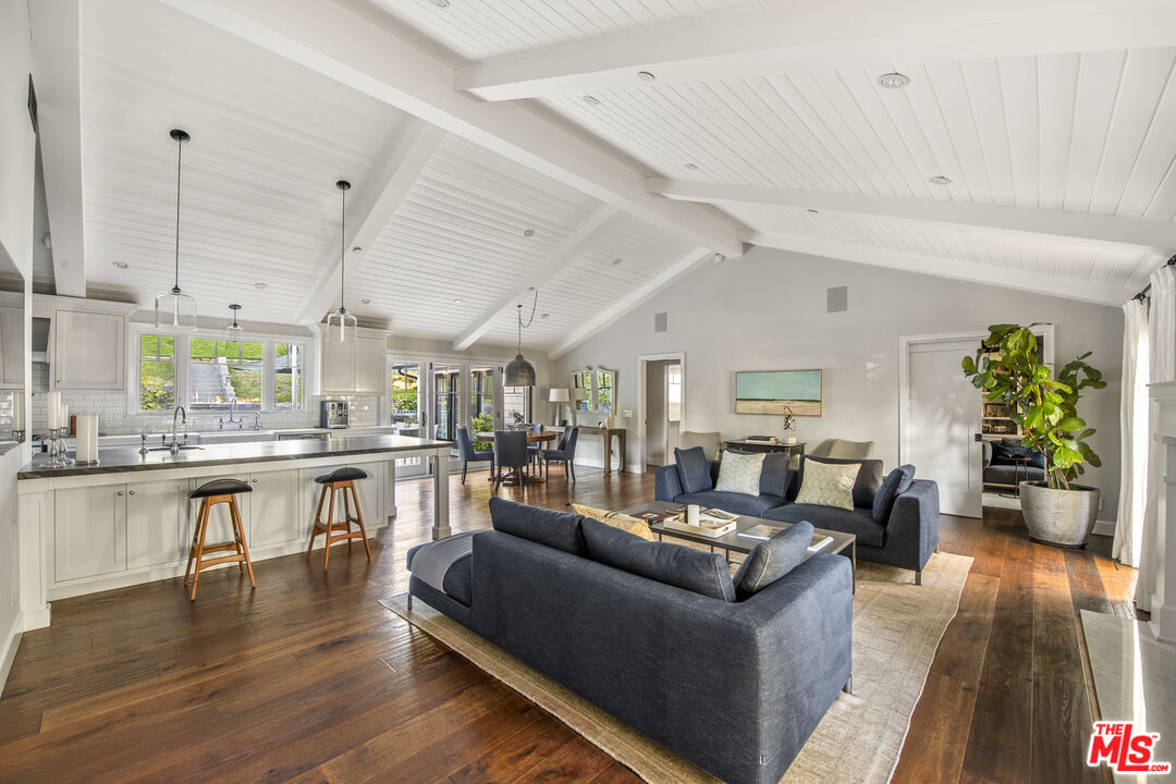 5549 Green Oak Drive Los Angeles, CA 90068 - Photo 7 of 26 a living room with furniture and a wooden floor