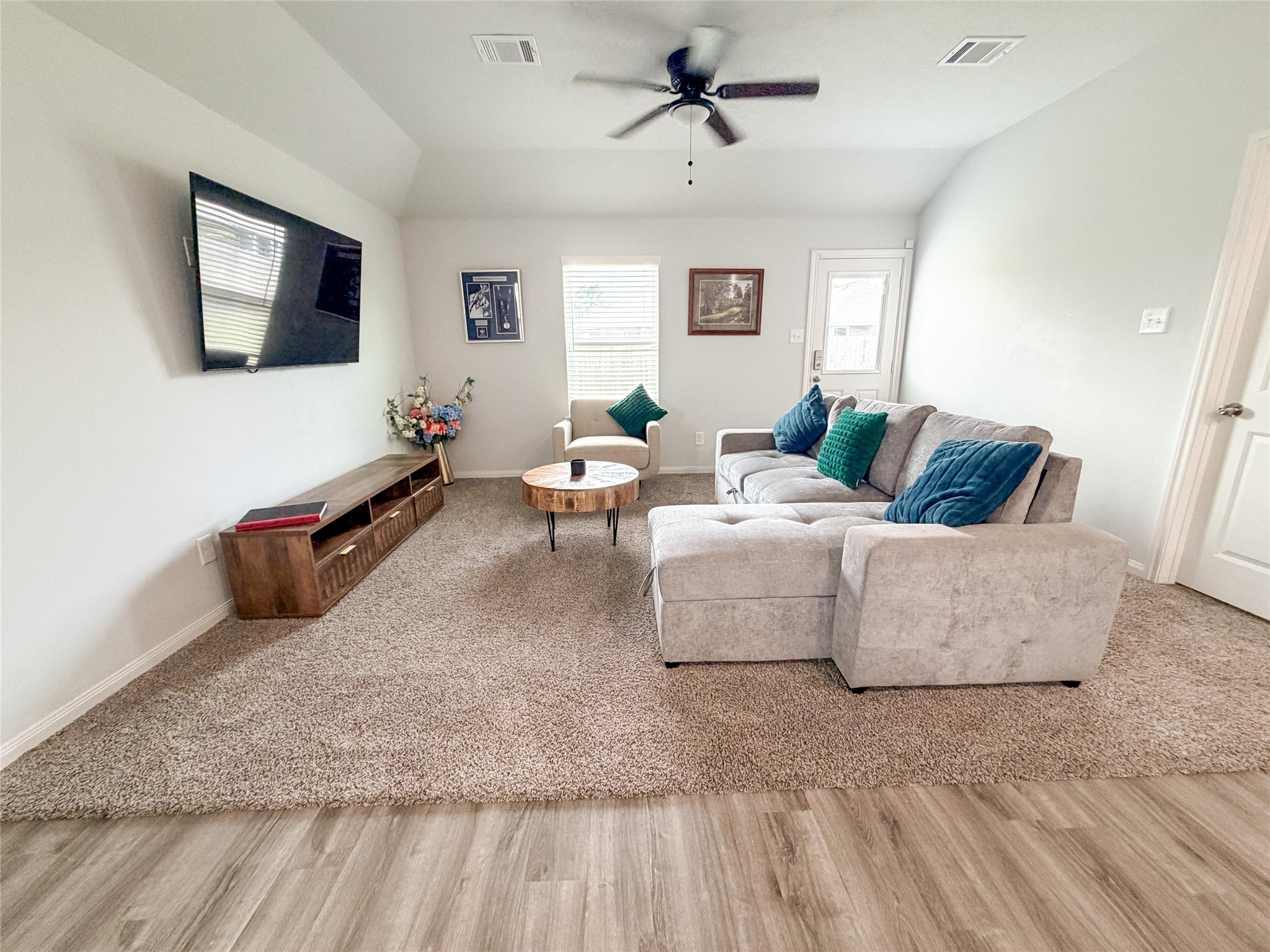 1513 22nd Street Hempstead, TX 77445 - Photo 5 of 12 a living room with furniture and a flat screen tv