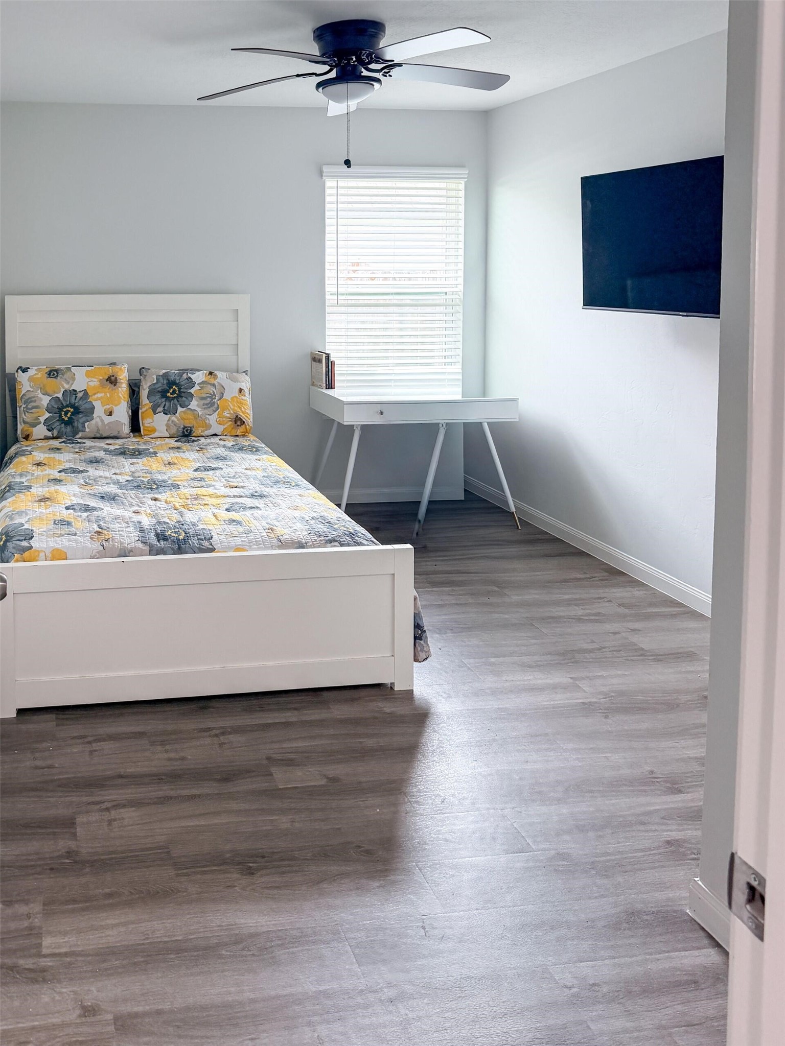 1513 22nd Street Hempstead, TX 77445 - Photo 6 of 12 a bedroom with a bed and window