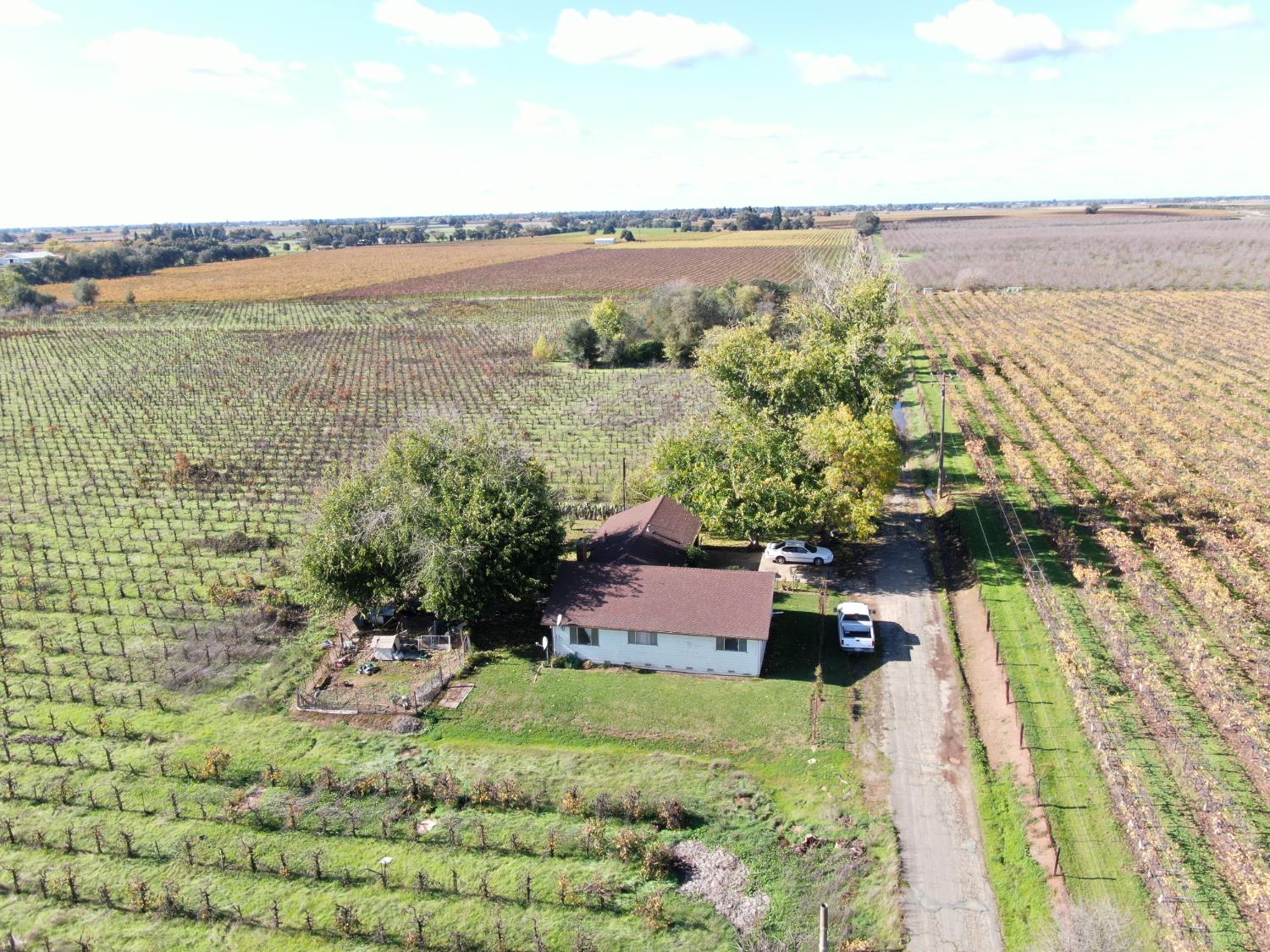 25839 Mackville Road Clements, CA 95227 - Photo 12 of 26 a view of a lake with a yard