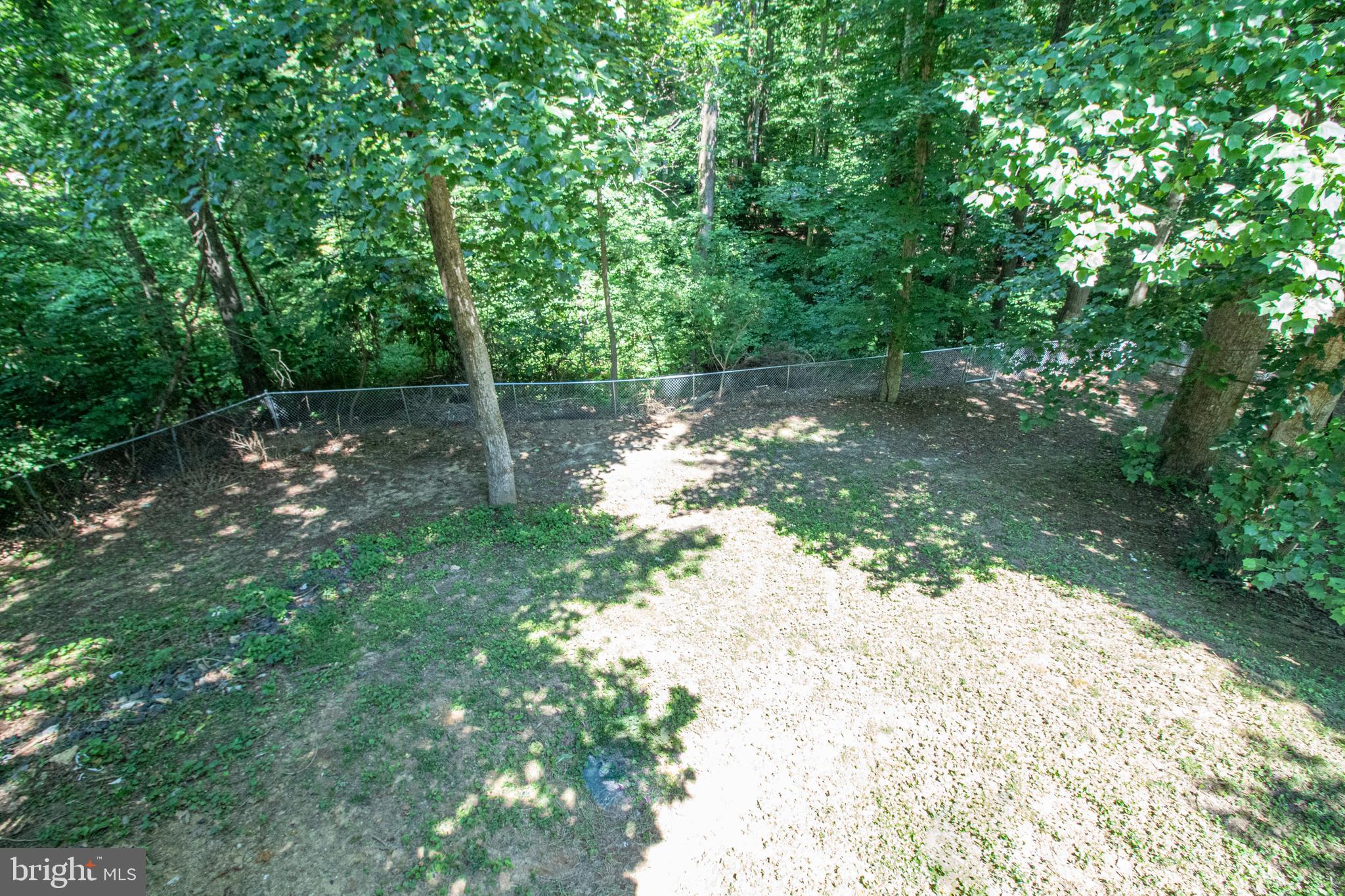 5741 Stephen Reid Road Huntingtown, MD 20639 - Photo 11 of 46 Large yard backs to woods