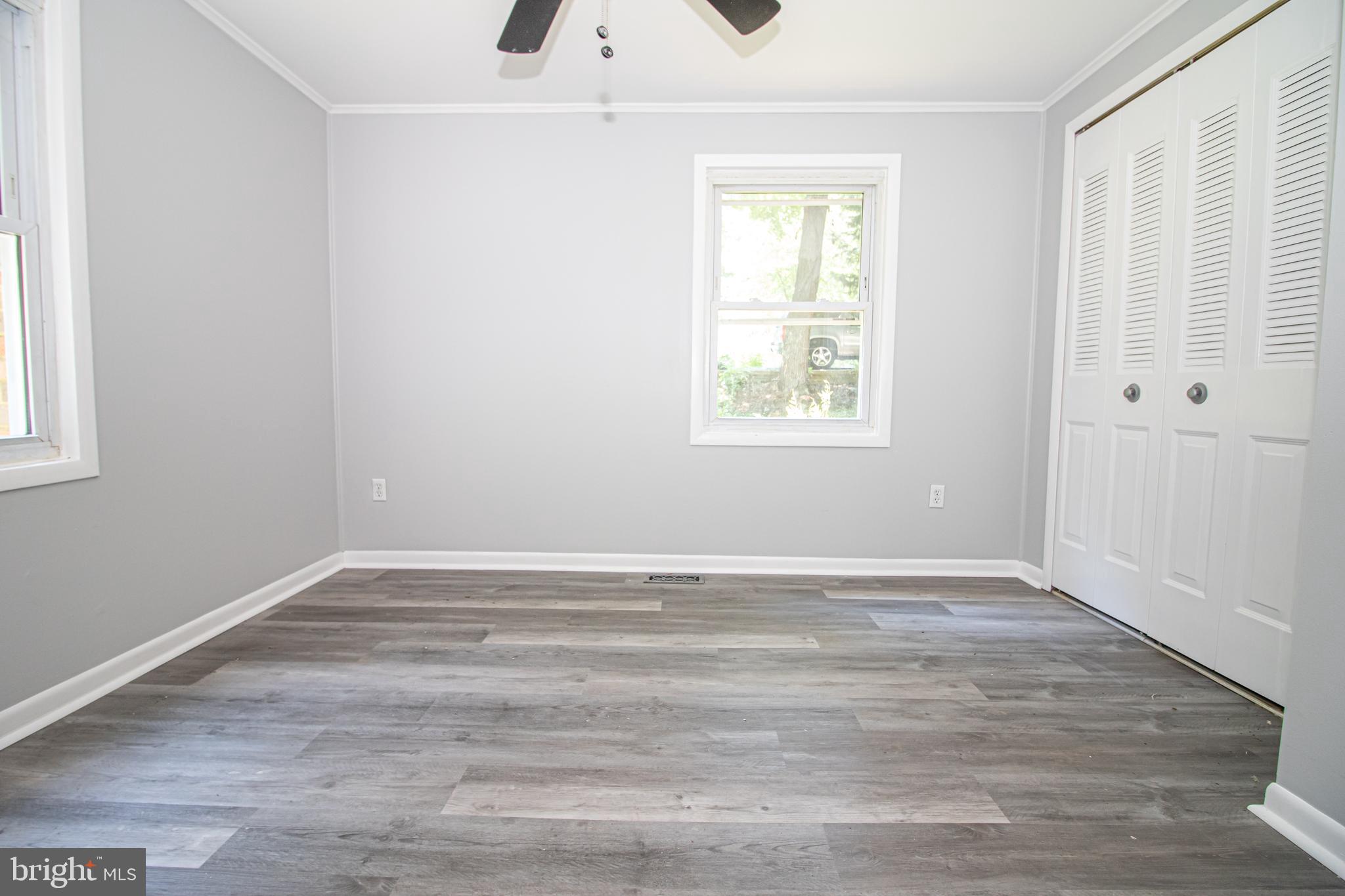 5741 Stephen Reid Road Huntingtown, MD 20639 - Photo 12 of 46 Bedroom 2 with ceiling fan