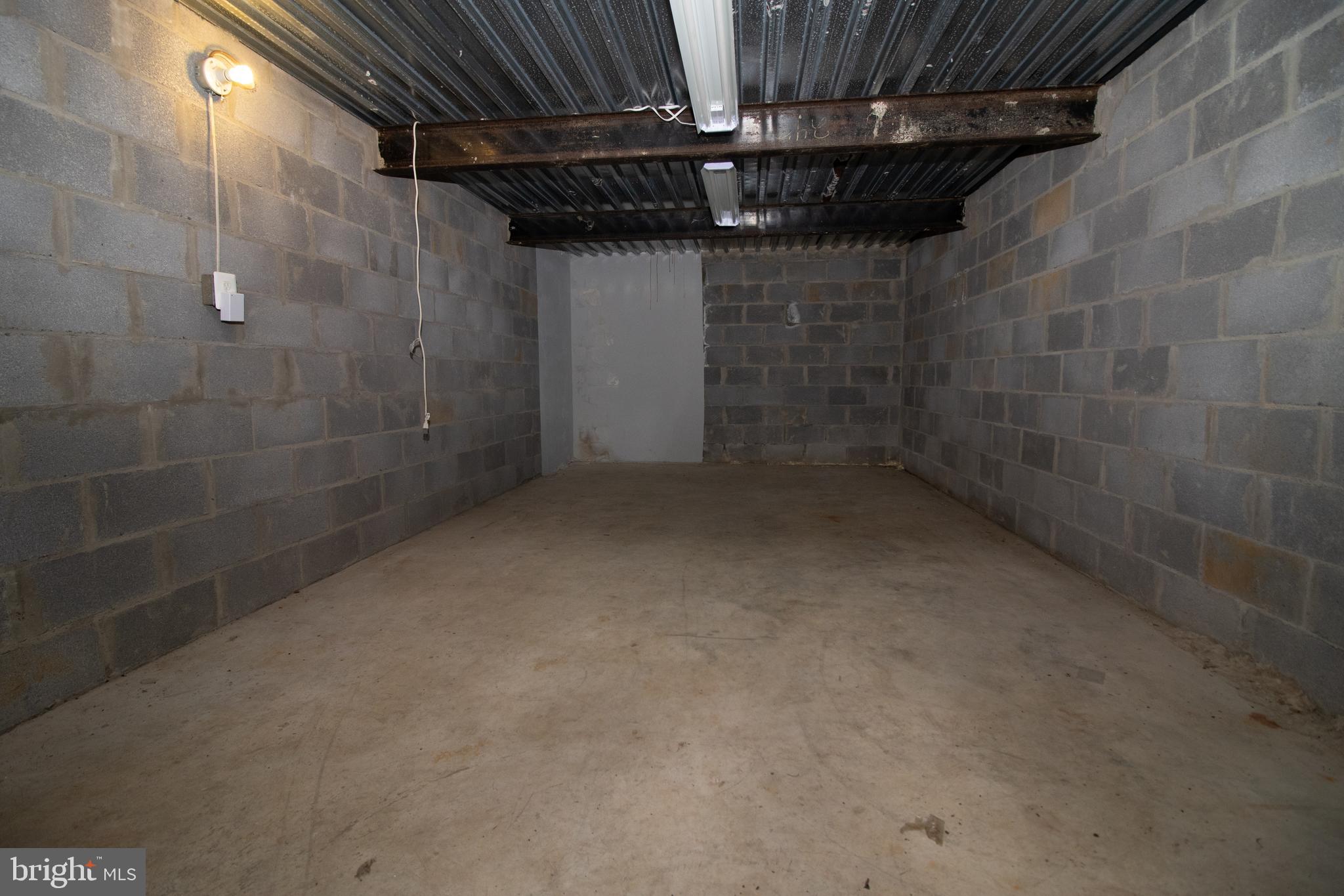 5741 Stephen Reid Road Huntingtown, MD 20639 - Photo 20 of 46 Large storage area under carport