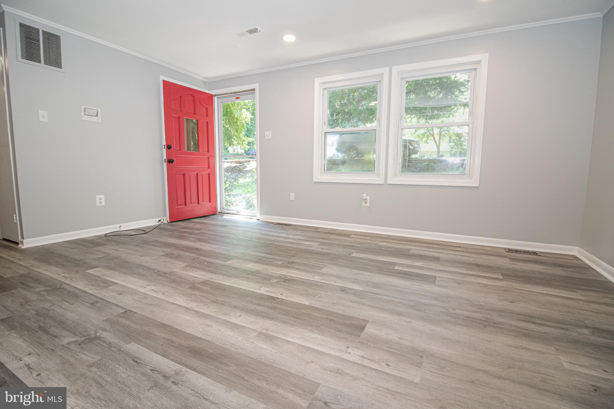 5741 Stephen Reid Road Huntingtown, MD 20639 - Photo 5 of 46 Living room with new floor