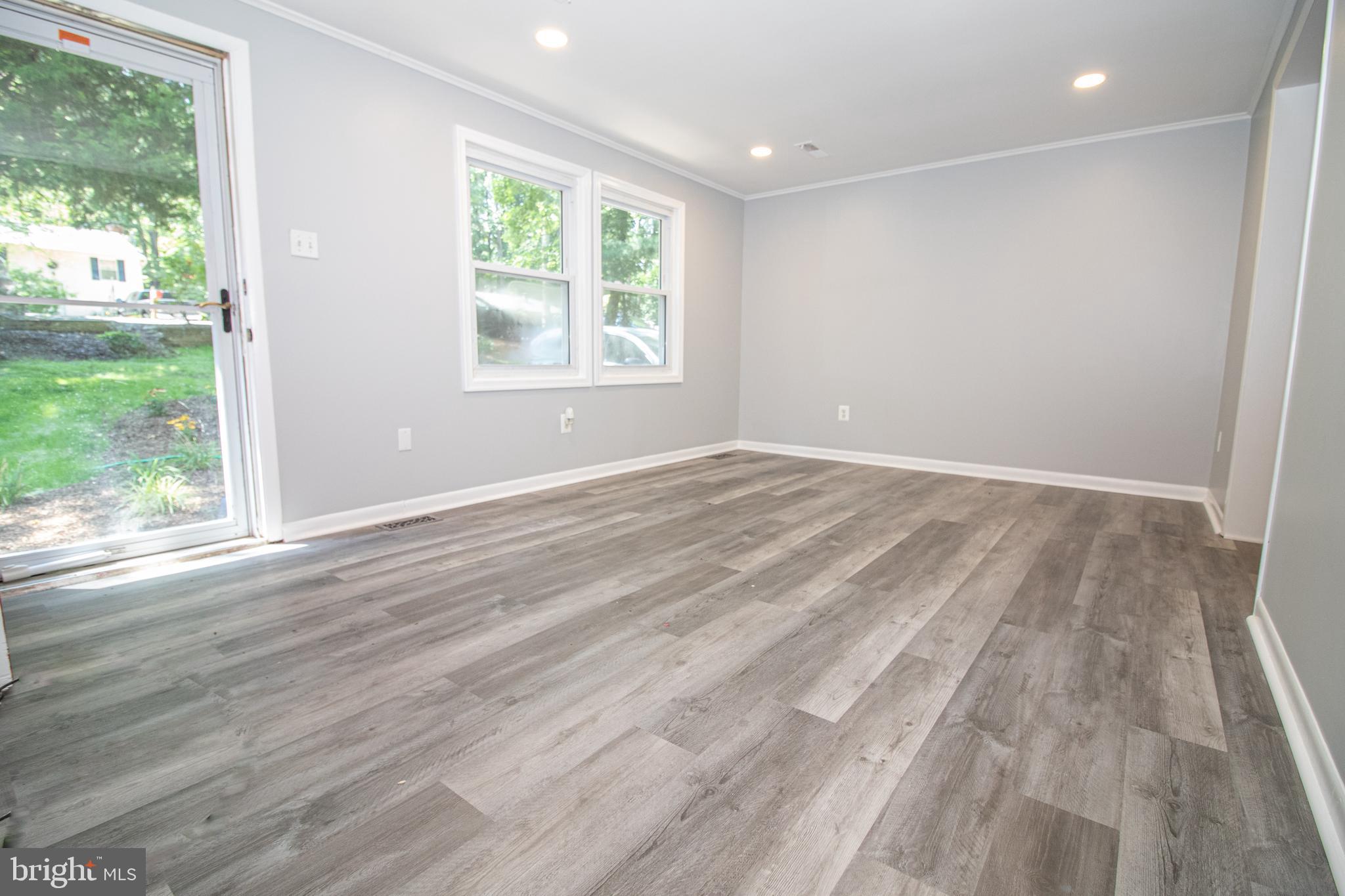 5741 Stephen Reid Road Huntingtown, MD 20639 - Photo 6 of 46 Living room with recess lighting