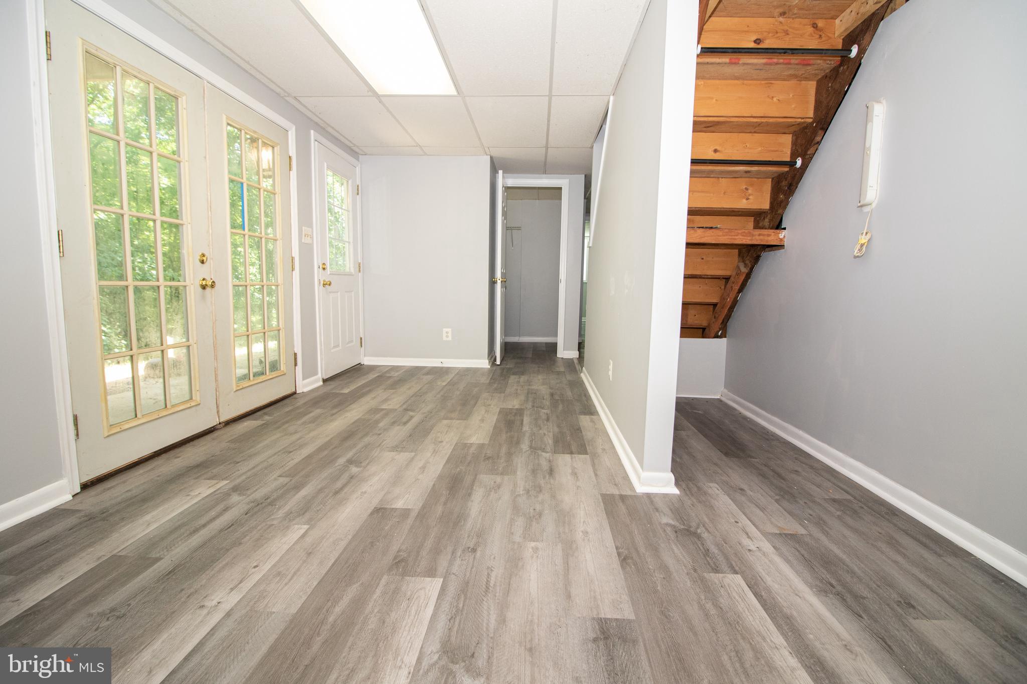 5741 Stephen Reid Road Huntingtown, MD 20639 - Photo 7 of 46 Walk out basement with new floor