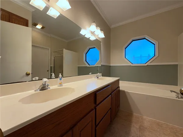 a bathroom with a sink and a toilet