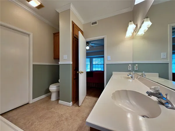 a view of a hallway with fireplace and furniture