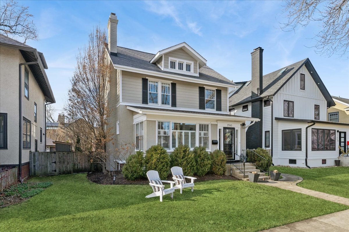 2740 Asbury Avenue Evanston, IL 60201 - Photo 1 of 40 a front view of a house with a garden