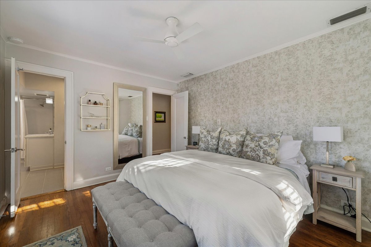 2740 Asbury Avenue Evanston, IL 60201 - Photo 19 of 40 a bedroom with a bed and a view of bedroom