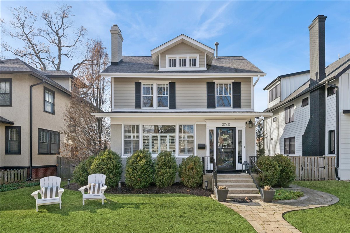 2740 Asbury Avenue Evanston, IL 60201 - Photo 2 of 40 a front view of a house with garden and porch