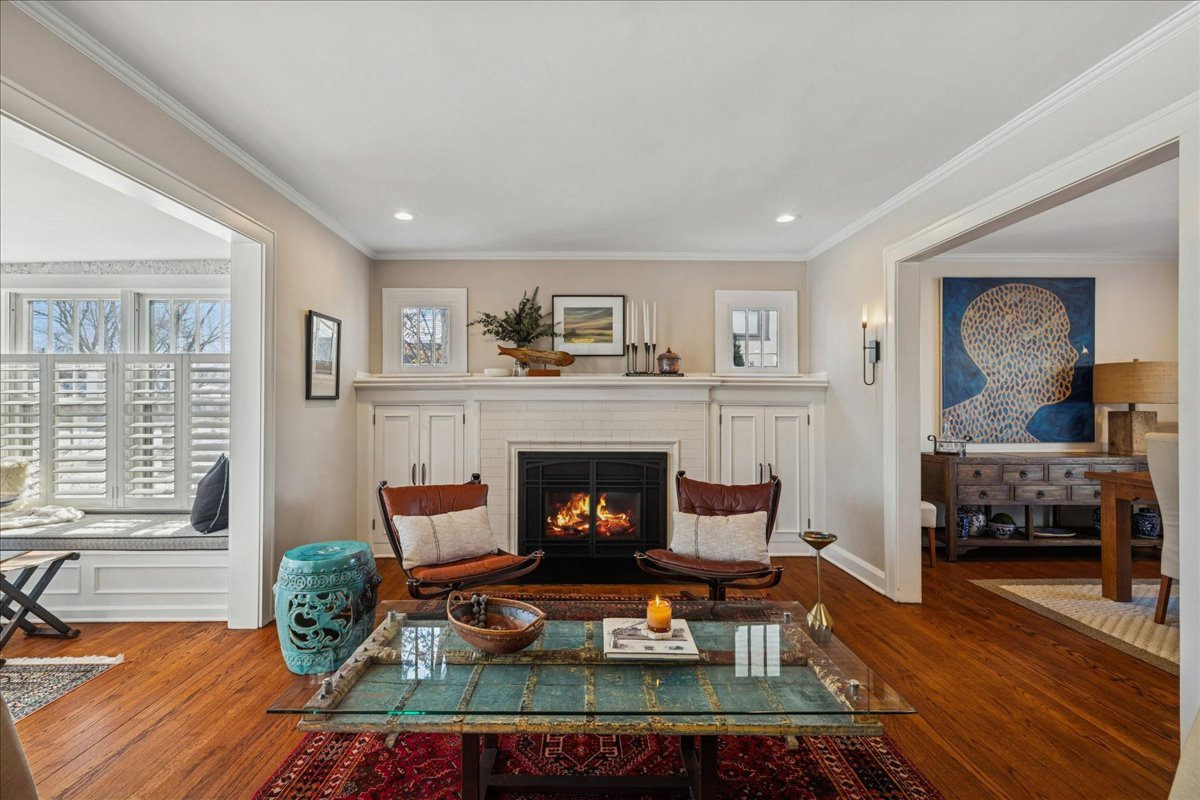 2740 Asbury Avenue Evanston, IL 60201 - Photo 6 of 40 a living room with furniture and a fireplace