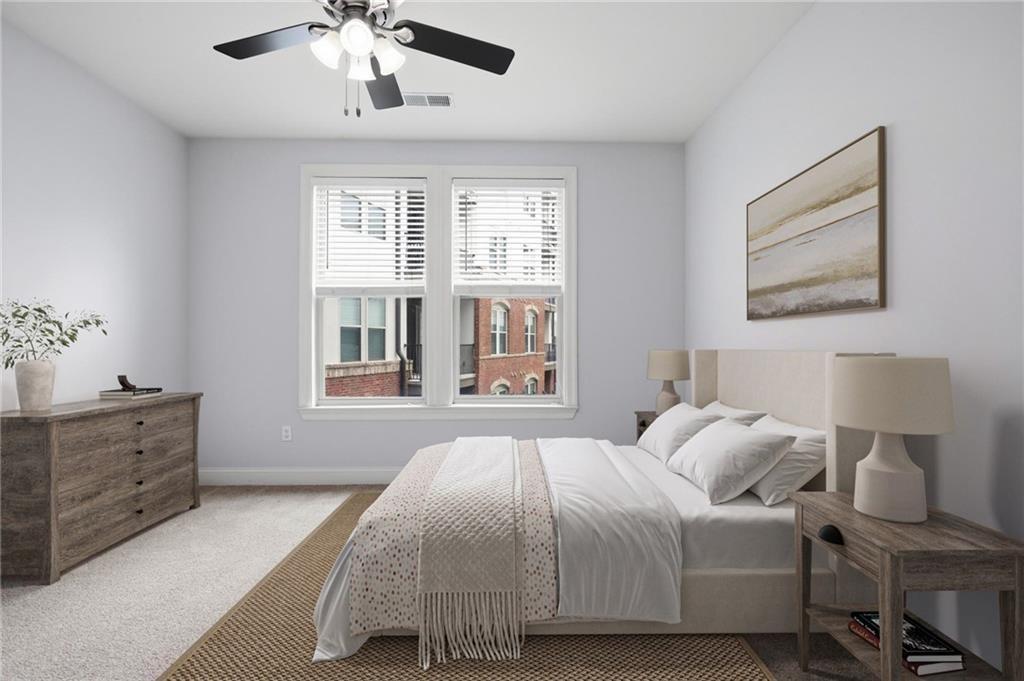 901 Abernathy Road Northeast, Unit 3080 Atlanta, GA 30328 - Photo 9 of 21 a spacious bedroom with a bed and window