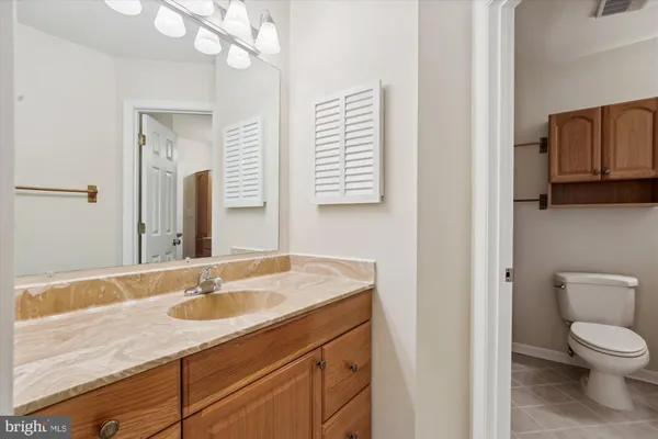 an empty room with closet area