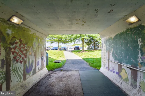 a view of a swimming pool with a yard